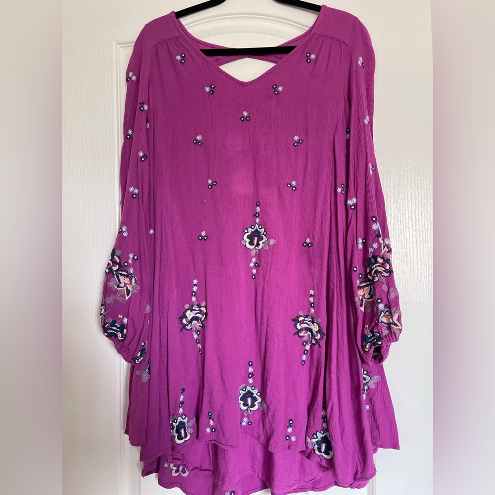Free people magenta dress with open back.